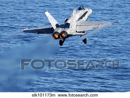 An F/A-18C Hornet taking off. View Large Photo Image Picture - An F/A-18C Hornet taking off.. Fotosearch