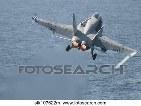 An F/A-18C Hornet taking off. View Large Photo Image Picture - An F/A-18C Hornet taking off.. Fotosearch