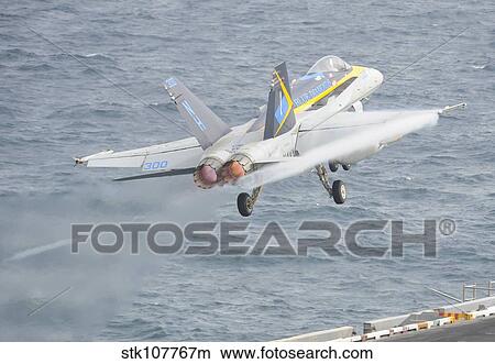 An F/A-18C Hornet taking off. View Large Photo Image Picture - An F/A-18C Hornet taking off.. Fotosearch