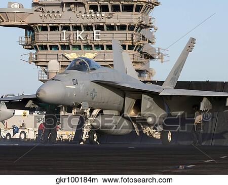 An F/A-18E Super Hornet during flight operations on USS Dwight D. Eisenhower View Large Photo Image Picture - An F/A-18E Super Hornet during flight operations on USS Dwight D. Eisenhower. Fotosearch