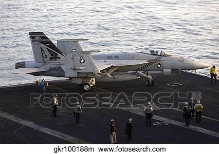 An F/A-18E Super Hornet during flight operations on USS Dwight D. Eisenhower. View Large Photo Image Picture - An F/A-18E Super Hornet during flight operations on USS Dwight D. Eisenhower.. Fotosearch