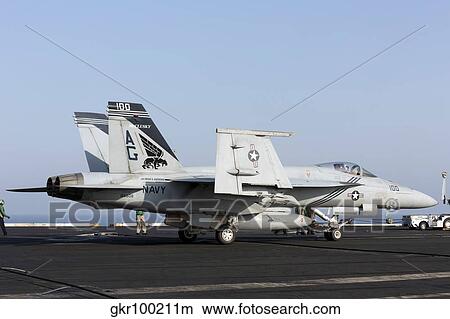 An F/A-18E Super Hornet during flight operations on USS Dwight D. Eisenhower. View Large Photo Image Picture - An F/A-18E Super Hornet during flight operations on USS Dwight D. Eisenhower.. Fotosearch