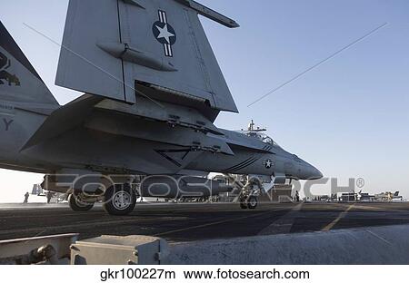 An F/A-18E Super Hornet during flight operations on USS Dwight D. Eisenhower. View Large Photo Image Picture - An F/A-18E Super Hornet during flight operations on USS Dwight D. Eisenhower.. Fotosearch