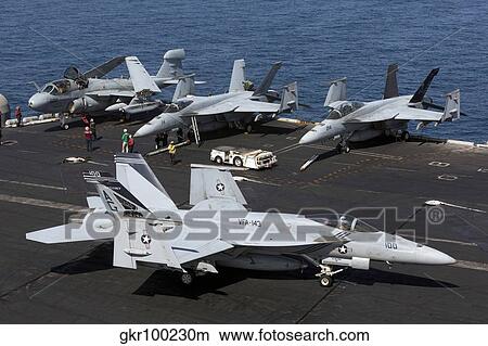An F/A-18E Super Hornet during flight operations on USS Dwight D. Eisenhower. View Large Photo Image Picture - An F/A-18E Super Hornet during flight operations on USS Dwight D. Eisenhower.. Fotosearch