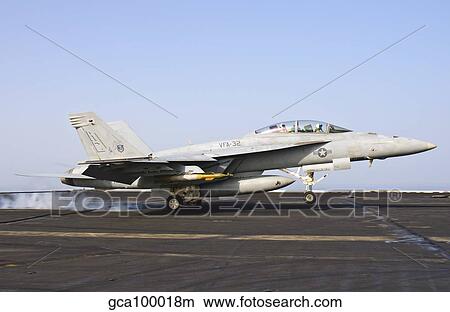 An F/A-18E Super Hornet lands aboard USS Harry S. Truman. View Large Photo Image Picture - An F/A-18E Super Hornet lands aboard USS Harry S. Truman.. Fotosearch