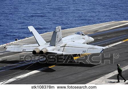 Picture - An F/A-18E Super Hornet lands on the flight deck of USS George Washington.. Fotosearch
