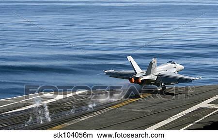 An F/A-18E Super Hornet launches from the flight deck of USS Carl Vinson. View Large Photo Image Picture - An F/A-18E Super Hornet launches from the flight deck of USS Carl Vinson.. Fotosearch