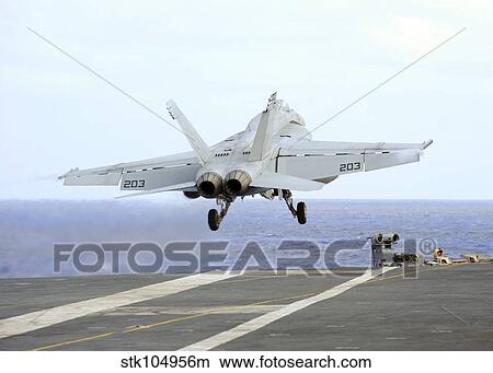 An F/A-18E Super Hornet launches from the aircraft carrier USS George Washington. View Large Photo Image Picture - An F/A-18E Super Hornet launches from the aircraft carrier USS George Washington.. Fotosearch