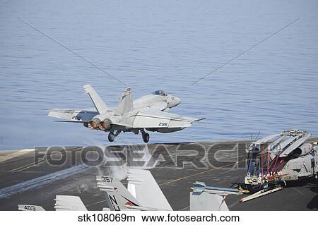 An F/A-18E Super Hornet launches from USS Nimitz. View Large Photo Image Picture - An F/A-18E Super Hornet launches from USS Nimitz.. Fotosearch