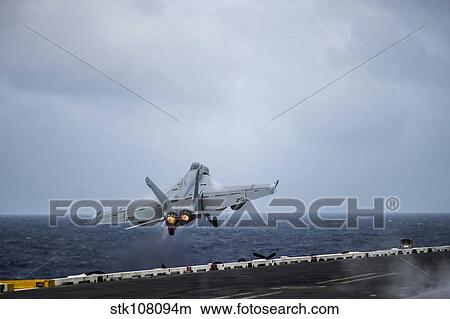An F/A-18E Super Hornet launches from USS George Washington. View Large Photo Image Picture - An F/A-18E Super Hornet launches from USS George Washington.. Fotosearch