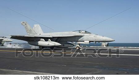 Picture - An F/A-18E Super Hornet launches from the flight deck of USS Harry S. Truman.. Fotosearch