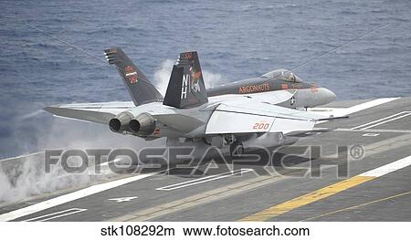 An F/A-18E Super Hornet launches from USS Nimitz. View Large Photo Image Picture - An F/A-18E Super Hornet launches from USS Nimitz.. Fotosearch
