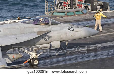 An F/A-18E Super Hornet on the catapult aboard USS George H. W. Bush. View Large Photo Image Picture - An F/A-18E Super Hornet on the catapult aboard USS George H. W. Bush.. Fotosearch