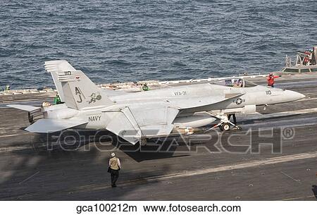 An F/A-18E Super Hornet on the flight deck of USS George H. W. Bush. View Large Photo Image Picture - An F/A-18E Super Hornet on the flight deck of USS George H. W. Bush.. Fotosearch
