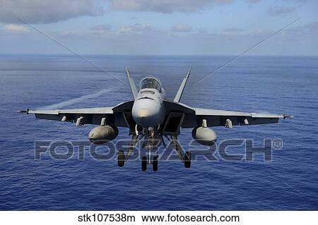 Picture - An F/A-18E Super Hornet over the Pacific Ocean.. Fotosearch