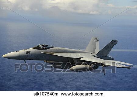 Picture - An F/A-18E Super Hornet over the Pacific Ocean.. Fotosearch