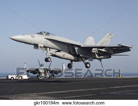 An F/A-18E Super Hornet prepares for landing aboard USS Dwight D. Eisenhower. View Large Photo Image Picture - An F/A-18E Super Hornet prepares for landing aboard USS Dwight D. Eisenhower.. Fotosearch