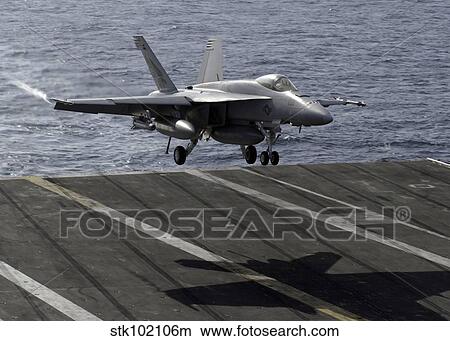 An F/A-18E Super Hornet prepares to land on the flight deck aboard USS Dwight D. Eisenhower. View Large Photo Image Picture - An F/A-18E Super Hornet prepares to land on the flight deck aboard USS Dwight D. Eisenhower.. Fotosearch
