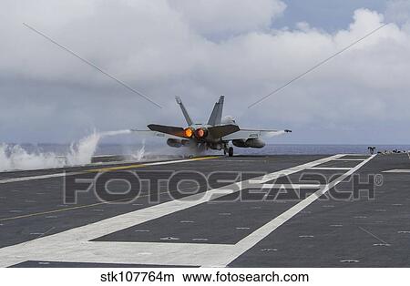An F/A-18E Super Hornet takes off from the flight deck of USS George Washington. View Large Photo Image Picture - An F/A-18E Super Hornet takes off from the flight deck of USS George Washington.. Fotosearch