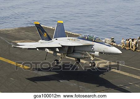 An F/A-18E Super Hornet trap landing on the flight deck of USS Harry S. Truman. View Large Photo Image Picture - An F/A-18E Super Hornet trap landing on the flight deck of USS Harry S. Truman.. Fotosearch