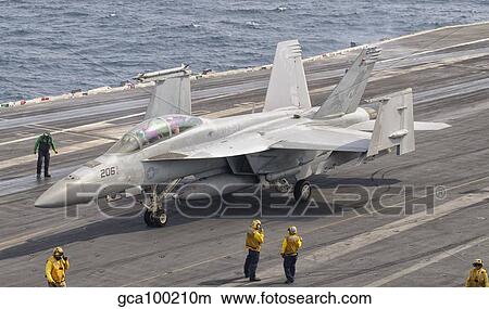 Picture - An F/A-18F Super Hornet aboard USS George H. W. Bush.. Fotosearch