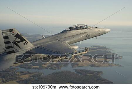 An F/A-18F Super Hornet armed with an AGM-88E AARGM missile. View Large Photo Image Picture - An F/A-18F Super Hornet armed with an AGM-88E AARGM missile.. Fotosearch