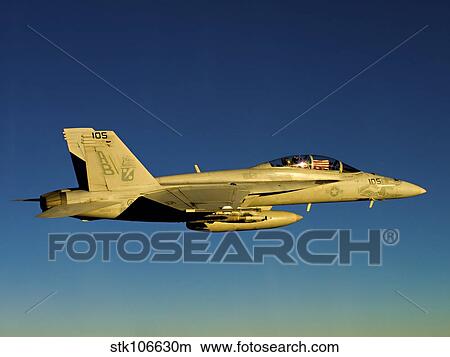 An F/A-18F Super Hornet displays the national ensign in the cockpit. View Large Photo Image Picture - An F/A-18F Super Hornet displays the national ensign in the cockpit.. Fotosearch