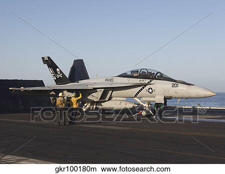 An F/A-18F Super Hornet during flight operations on USS Dwight D. Eisenhower. View Large Photo Image Picture - An F/A-18F Super Hornet during flight operations on USS Dwight D. Eisenhower.. Fotosearch