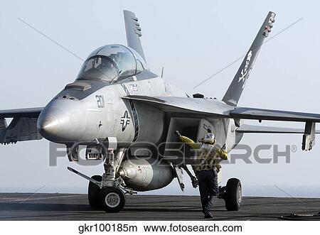 An F/A-18F Super Hornet during flight operations on USS Dwight D. Eisenhower. View Large Photo Image Picture - An F/A-18F Super Hornet during flight operations on USS Dwight D. Eisenhower.. Fotosearch
