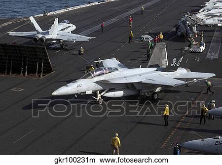 An F/A-18F Super Hornet during flight operations on USS Dwight D. Eisenhower. View Large Photo Image Picture - An F/A-18F Super Hornet during flight operations on USS Dwight D. Eisenhower.. Fotosearch