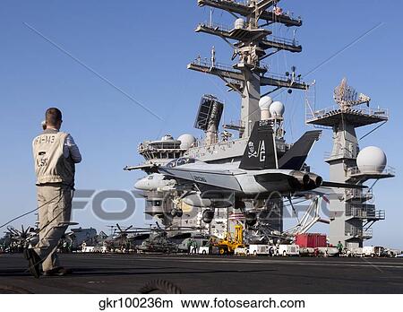 An F/A-18F Super Hornet during flight operations on USS Dwight D. Eisenhower. View Large Photo Image Picture - An F/A-18F Super Hornet during flight operations on USS Dwight D. Eisenhower.. Fotosearch