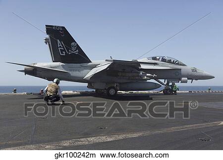 An F/A-18F Super Hornet during flight operations on USS Dwight D. Eisenhower. View Large Photo Image Picture - An F/A-18F Super Hornet during flight operations on USS Dwight D. Eisenhower.. Fotosearch