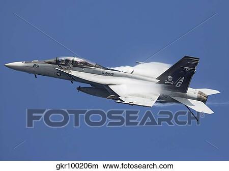 An F/A-18F Super Hornet in flight over the Arabian Sea. View Large Photo Image Picture - An F/A-18F Super Hornet in flight over the Arabian Sea.. Fotosearch