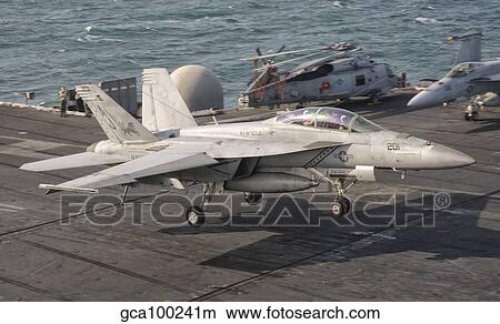 An F/A-18F Super Hornet landing aboard USS George H. W. Bush. View Large Photo Image Picture - An F/A-18F Super Hornet landing aboard USS George H. W. Bush.. Fotosearch