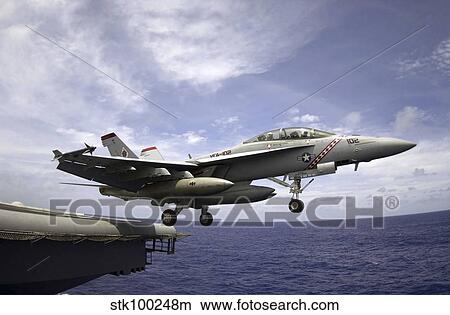 Picture - An F/A-18F Super Hornet launches from the flight deck of USS Kitty Hawk.. Fotosearch