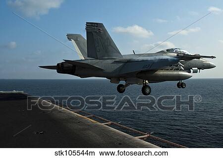 An F/A-18F Super Hornet launches from USS John C. Stennis. View Large Photo Image Picture - An F/A-18F Super Hornet launches from USS John C. Stennis.. Fotosearch