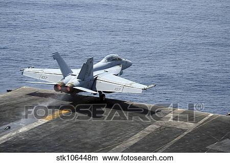 An F/A-18F Super Hornet launches from the aircraft carrier USS Enterprise. View Large Photo Image Picture - An F/A-18F Super Hornet launches from the aircraft carrier USS Enterprise.. Fotosearch