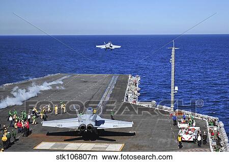 An F/A-18F Super Hornet launches from USS Carl Vinson. View Large Photo Image Picture - An F/A-18F Super Hornet launches from USS Carl Vinson.. Fotosearch