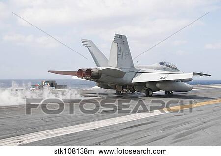 Picture - An F/A-18F Super Hornet launches from the flight deck of USS George Washington.. Fotosearch