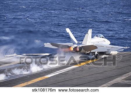 An F/A-18F Super Hornet launches from USS Nimitz. View Large Photo Image Picture - An F/A-18F Super Hornet launches from USS Nimitz.. Fotosearch