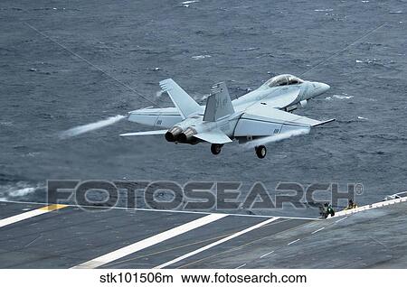 Picture - An F/A-18F Super Hornet launches off the flight deck of USS Kitty Hawk.. Fotosearch