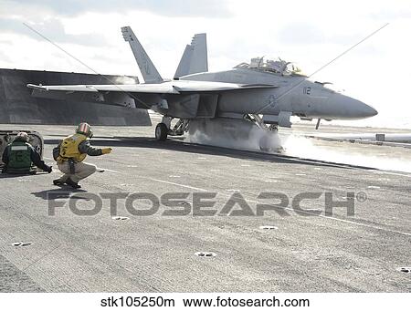 An F/A-18F Super Hornet launches off the flight deck of USS Enterprise. View Large Photo Image Picture - An F/A-18F Super Hornet launches off the flight deck of USS Enterprise.. Fotosearch