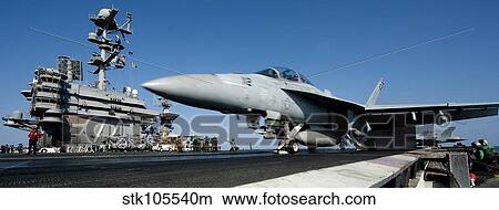 An F/A-18F Super Hornet launches off the flight deck of USS John C. Stennis. View Large Photo Image Picture - An F/A-18F Super Hornet launches off the flight deck of USS John C. Stennis.. Fotosearch