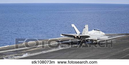 An F/A-18F Super Hornet launches off the flight deck of USS Nimitz. View Large Photo Image Picture - An F/A-18F Super Hornet launches off the flight deck of USS Nimitz.. Fotosearch