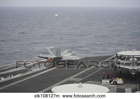 An F/A-18F Super Hornet launches off the flight deck of USS Nimitz. View Large Photo Image Picture - An F/A-18F Super Hornet launches off the flight deck of USS Nimitz.. Fotosearch