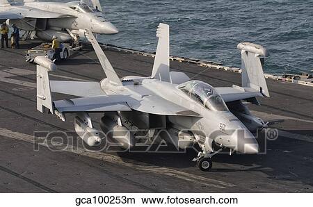 An F/A-18F Super Hornet moving to the catapult aboard USS George H. W. Bush. View Large Photo Image Picture - An F/A-18F Super Hornet moving to the catapult aboard USS George H. W. Bush.. Fotosearch