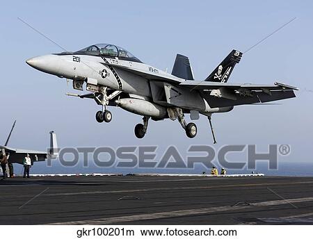 An F/A-18F Super Hornet prepares for landing aboard USS Dwight D. Eisenhower. View Large Photo Image Picture - An F/A-18F Super Hornet prepares for landing aboard USS Dwight D. Eisenhower.. Fotosearch