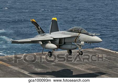An F/A-18F Super Hornet prepares to land aboard USS Eisenhower. View Large Photo Image Picture - An F/A-18F Super Hornet prepares to land aboard USS Eisenhower.. Fotosearch