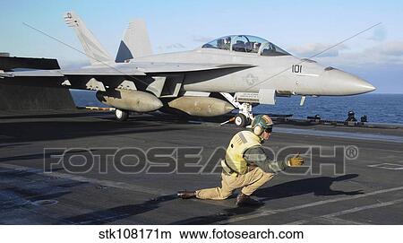 An F/A-18F Super Hornet prepares to launch from the flight deck of USS Nimitz. View Large Photo Image Picture - An F/A-18F Super Hornet prepares to launch from the flight deck of USS Nimitz.. Fotosearch