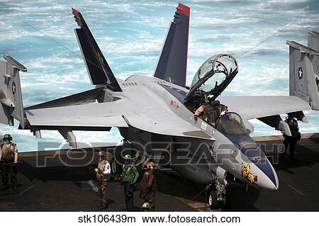 Picture - An F/A-18F Super Hornet sits on the flight deck of USS Enterprise.. Fotosearch